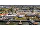 Waterfront home with a private dock and screened in porch, perfect for enjoying the Florida weather at 13705 Allyn Dr, Hudson, FL 34667