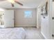 Spacious bedroom with wood floors and an attached closet at 13705 Allyn Dr, Hudson, FL 34667