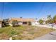 Charming single-story home with a well-maintained lawn and a convenient attached garage at 13705 Allyn Dr, Hudson, FL 34667