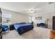 Spacious bedroom with a large window and neutral walls at 194 Argyll Dr, Spring Hill, FL 34609
