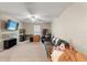 Spacious bonus room with carpet flooring, ceiling fan, and large windows at 194 Argyll Dr, Spring Hill, FL 34609