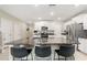 Kitchen boasting granite countertops, stainless steel appliances, and a large island at 194 Argyll Dr, Spring Hill, FL 34609
