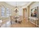 Charming dining room with ample natural light, chandelier, and neutral tones at 20200 Lace Cascade Rd, Land O Lakes, FL 34637