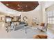 Open-concept living room with stylish decor, neutral tones, and seamless flow to the kitchen at 20200 Lace Cascade Rd, Land O Lakes, FL 34637