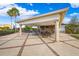 Inviting outdoor pavilion with ample seating, stone accents, and views of the surrounding community at 20200 Lace Cascade Rd, Land O Lakes, FL 34637