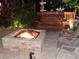 Backyard firepit with outdoor seating, perfect for cozy evenings under the stars at 3308 Oleander Dr, Hernando Beach, FL 34607