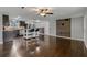 Spacious open concept kitchen with island, stainless appliances, and wood flooring at 3540 Linkwood St, New Port Richey, FL 34652