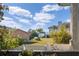Beautiful backyard with lush lawn and mature landscaping offering serene views of the water at 3912 Rudder Way, New Port Richey, FL 34652