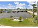 Aerial view of the Gulf Harbors Civic Center with parking and bay access at 3912 Rudder Way, New Port Richey, FL 34652