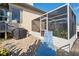 Charming patio with outdoor grill and lounge chair perfect for relaxing and outdoor entertainment at 3912 Rudder Way, New Port Richey, FL 34652