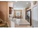 Cozy kitchen nook with a breakfast bar, stainless steel appliances, and bright natural light at 12824 Tikal Way, Trinity, FL 34655