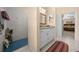 Bathroom featuring modern white vanity and a walk-in shower at 16325 Hibiscus Rd, Brooksville, FL 34601