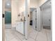 Bathroom with granite countertops, tile flooring, and modern finishes at 16325 Hibiscus Rd, Brooksville, FL 34601