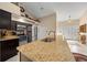 Stylish kitchen with granite countertops, stainless steel appliances, and ample natural light at 16325 Hibiscus Rd, Brooksville, FL 34601