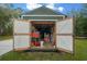 A large open shed interior provides plenty of room for storage and a workbench at 16325 Hibiscus Rd, Brooksville, FL 34601