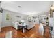 Inviting living room with hardwood floors, plantation shutters, and elegant decor, creating a cozy atmosphere at 18819 Sunterra Dr, Land O Lakes, FL 34638