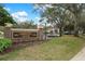 Community center sign with well-maintained landscaping and convenient parking, showcasing the community's amenities at 5548 Cannonade Dr, Wesley Chapel, FL 33544