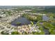 Aerial view of the home in a Gathering-friendly community with lake access at 5771 Catskill Rd, Holiday, FL 34690