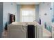 Comfortable bathtub in bathroom adorned with nautical decorations and marine wildlife wall stickers at 5771 Catskill Rd, Holiday, FL 34690