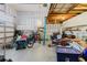Garage with storage, a bike, and an open layout for versatile use at 5771 Catskill Rd, Holiday, FL 34690
