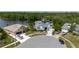Street view showcasing the home's location in a cul-de-sac, curb appeal, and manicured landscaping at 5771 Catskill Rd, Holiday, FL 34690