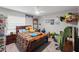 Cozy bedroom with natural light, charming decor, and playful accents creating a comfortable and inviting space at 7482 Winter St, Brooksville, FL 34613