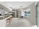 Inviting kitchen and dining area showcasing granite countertops and a view of the pool at 7482 Winter St, Brooksville, FL 34613