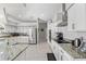 Large kitchen featuring granite countertops, stainless steel appliances, and ample cabinet space at 7482 Winter St, Brooksville, FL 34613