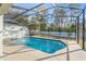 Enjoy the screened-in pool with ample deck space for outdoor relaxation and entertainment at 7482 Winter St, Brooksville, FL 34613