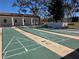 Well-kept shuffleboard courts offer a fun recreational activity in the community at 12408 Eagleswood Dr # B, Hudson, FL 34667