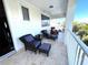 Outdoor balcony with comfortable seating provides a peaceful space to relax and unwind at 1421 Apollo Beach Blvd, Apollo Beach, FL 33572