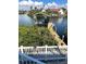 Picturesque view of boat dock, waterfront and lush surroundings, ideal for boating enthusiasts at 1421 Apollo Beach Blvd, Apollo Beach, FL 33572