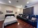 Versatile bonus room features a Murphy bed and theater seating, perfect for guests at 1421 Apollo Beach Blvd, Apollo Beach, FL 33572