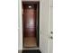 Interior elevator with wood paneling and flooring provides easy access to all floors at 1421 Apollo Beach Blvd, Apollo Beach, FL 33572