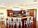 Open kitchen with a large island, stainless steel appliances, and ample cabinet space at 1421 Apollo Beach Blvd, Apollo Beach, FL 33572