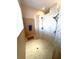 An elegant shower with tile flooring and walls with a window for natural light at 1421 Apollo Beach Blvd, Apollo Beach, FL 33572