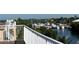 Beautiful water view from the balcony showcasing a marina with boats and waterfront homes at 1421 Apollo Beach Blvd, Apollo Beach, FL 33572