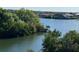 Scenic water view with lush greenery, showcasing the serene coastal environment and waterfront at 1421 Apollo Beach Blvd, Apollo Beach, FL 33572