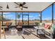Spacious screened lanai with comfortable seating and peaceful backyard views at 2109 Trillium Blvd, Brooksville, FL 34604