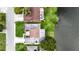 Aerial view of the property and the waterway behind the property at 3526 Overland Dr, Holiday, FL 34691