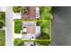 Aerial view of the home and surrounding property with waterfront access at 3526 Overland Dr, Holiday, FL 34691
