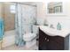 Charming bathroom with a bathtub, shower, and stylish sink, offering a spa-like experience at 3526 Overland Dr, Holiday, FL 34691