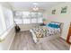 Light-filled bedroom with water views, creating a tranquil and inviting retreat at 3526 Overland Dr, Holiday, FL 34691