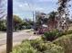 Street view of Millpond Lakes entrance, showcasing well-maintained landscaping and community signage at 4529 Whitton Way # 214, New Port Richey, FL 34653