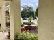 Landscaped building entrance featuring colorful plants and mulch, creating a welcoming atmosphere at 4529 Whitton Way # 214, New Port Richey, FL 34653