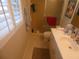 Bathroom with a shower and vanity featuring great natural light at 4801 Airport Rd # 208, Zephyrhills, FL 33542