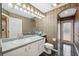 Bathroom featuring a large mirror, vanity, tile floor, and shower at 6112 Kinlock Ave, Spring Hill, FL 34608
