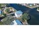 Waterfront home featuring a boat dock and private canal access at 6801 Nowiki Ave, Hudson, FL 34667