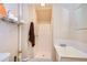 Cozy bathroom featuring a stand-up shower, sink, and toilet in a well-lit space at 6801 Nowiki Ave, Hudson, FL 34667