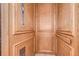 Close-up of an elevator with wood paneling and classic button controls at 6801 Nowiki Ave, Hudson, FL 34667